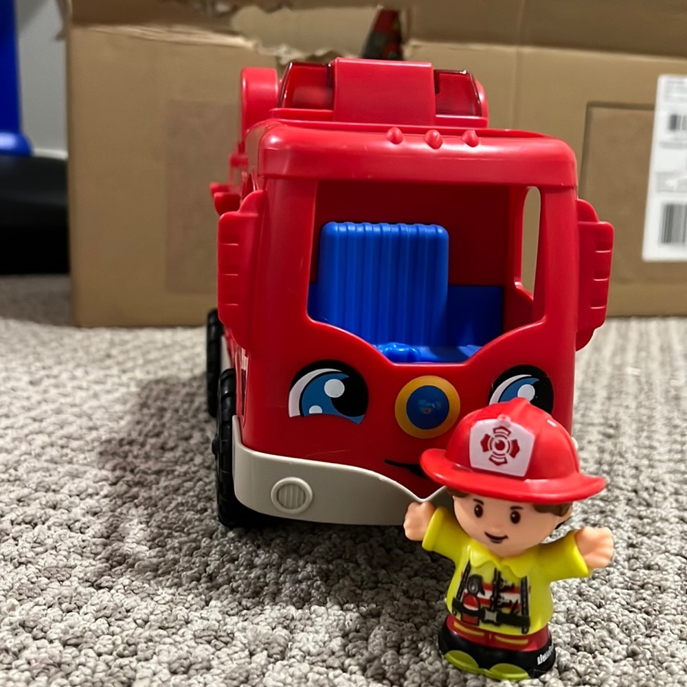 Little people fire truck with firefighter